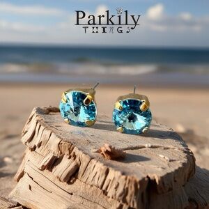 Handcrafted petite stud earrings with sparkly aqua Swarovski crystals
